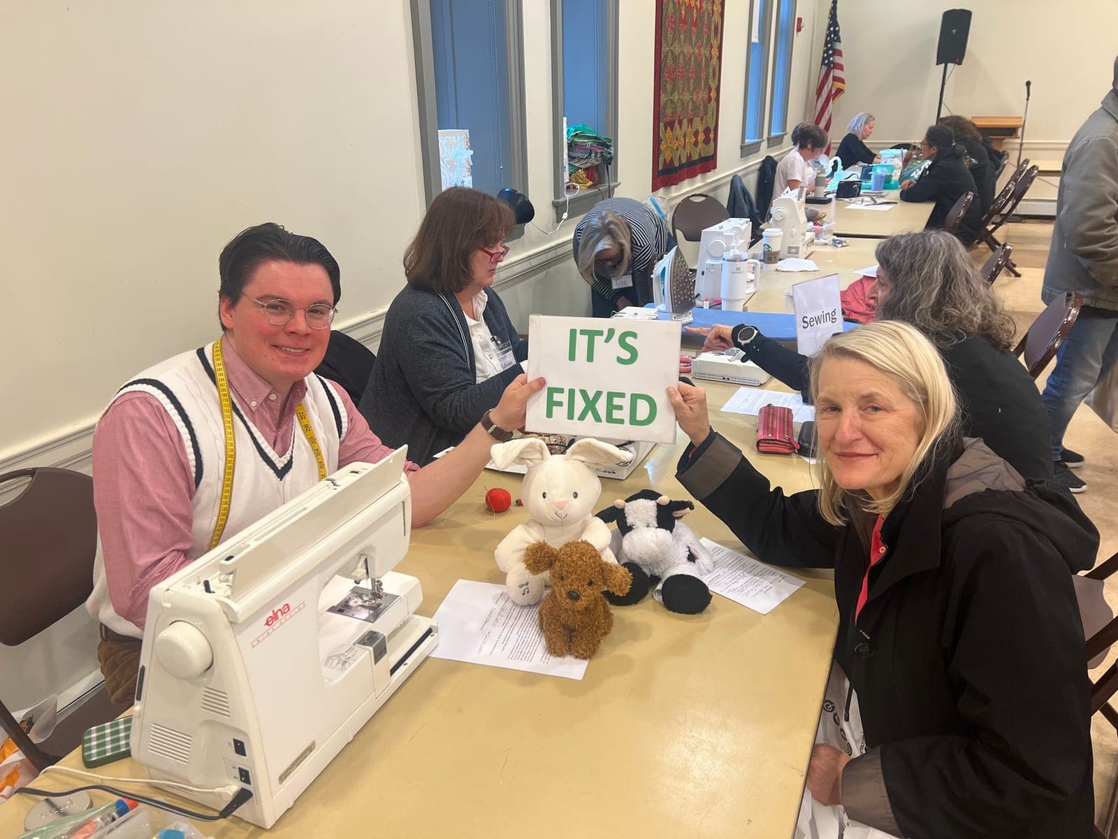 Max Bonanno and Christine Farner help give well-loved stuffed animals a new life at a previous Madison Repair Cafe.