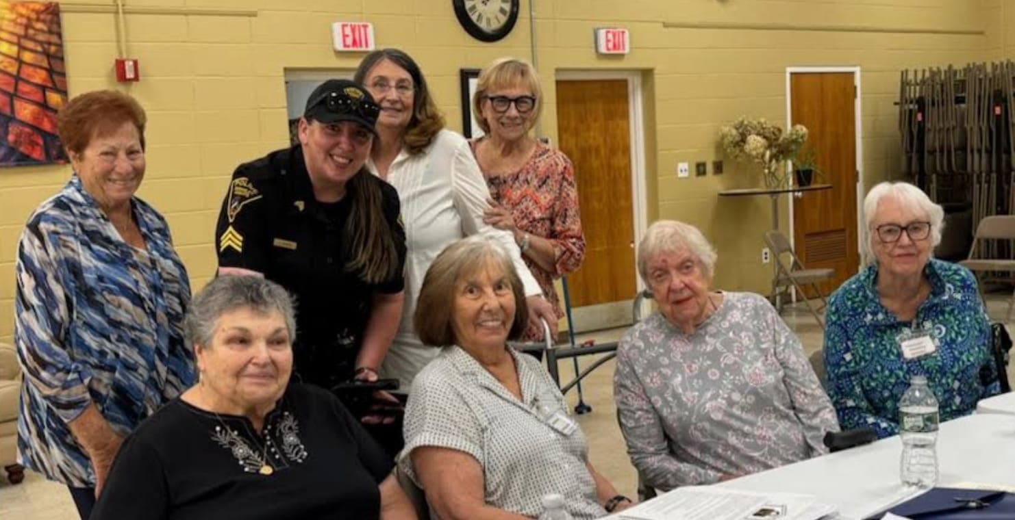 Standing, from left: Iris Rispoli, Sergeant Fagan, Diana Wifrid and Susan Doyle. Seated, from left: President Phyllis McEnroe, Chris Bjornstad, Claire Stang and Katie Eaton.